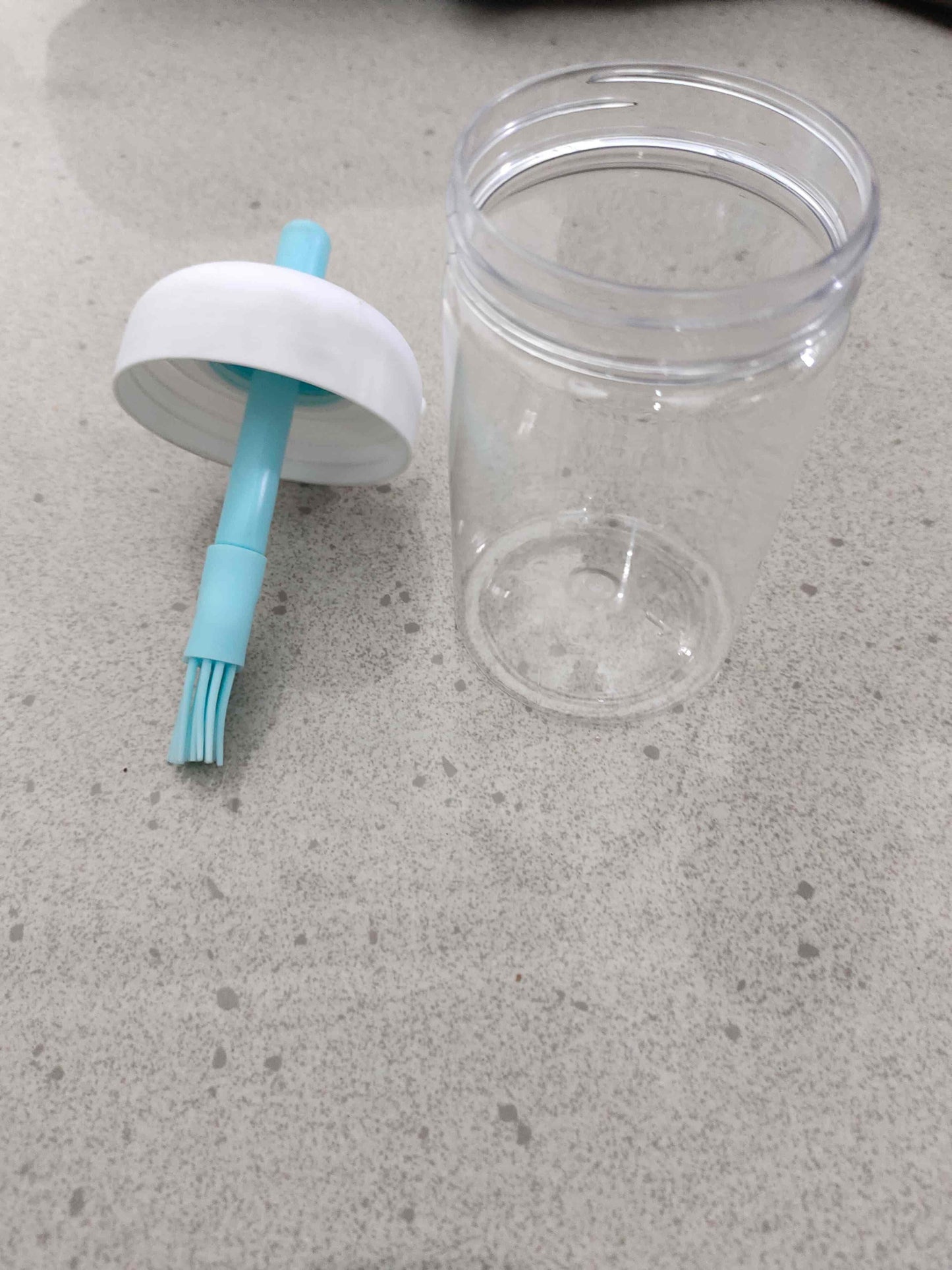THE GIR FARMER oil dispenser for kitchen cooking clear plastic bottle with white lid and teal silicone brush
