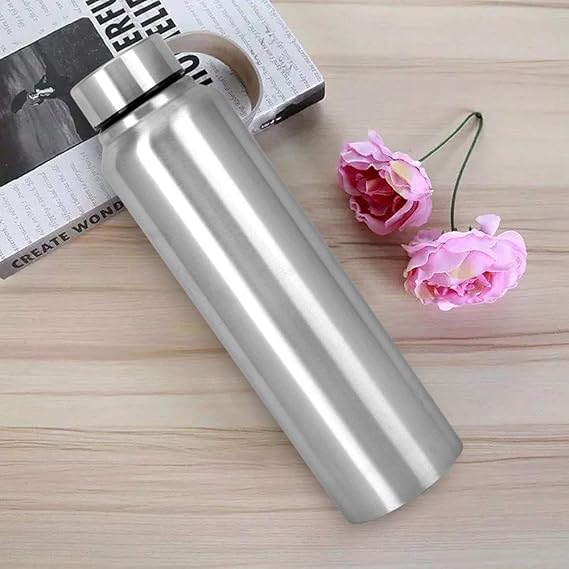 Infinity Artic Bottle stainless steel water bottle 1000ml with sleek silver finish on wooden surface