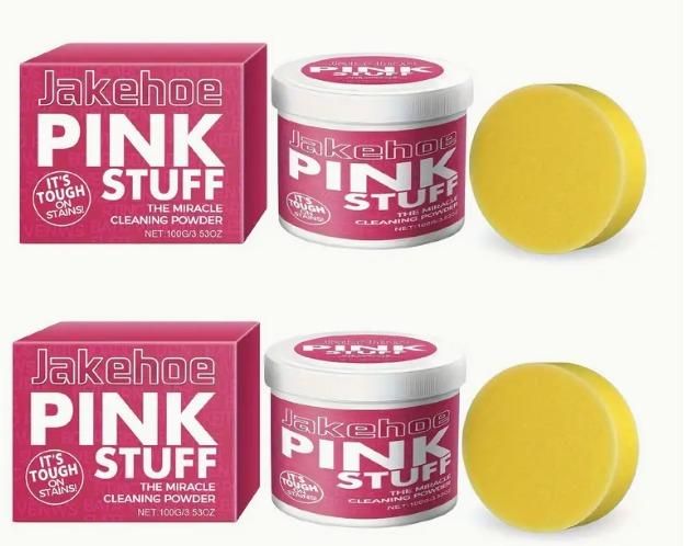 Jakehoe Pink Stuff tough stain remover powder with two pink tubs and yellow scrubbing sponges
