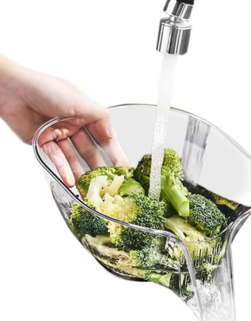 Clear kitchen sink drain basket for easy washing and draining of vegetables like broccoli