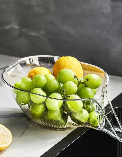 Stylish kitchen sink drain basket with green grapes and lemons for fruit storage