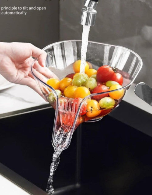 Dropdash kitchen sink drain basket holding fresh fruits with water flowing through it