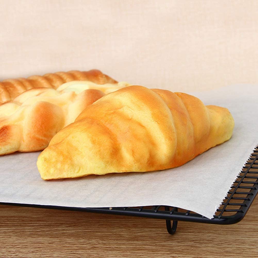 Your Brand microwave oven safe baking paper under freshly baked croissants cooling on rack