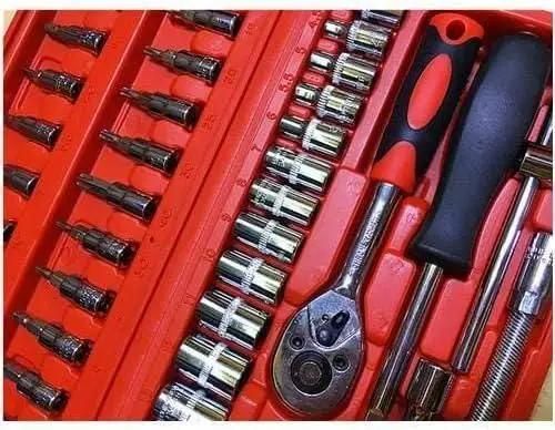 Close-up view of a large all-in-one repair toolkit with socket wrenches and various tool bits organized in a red case