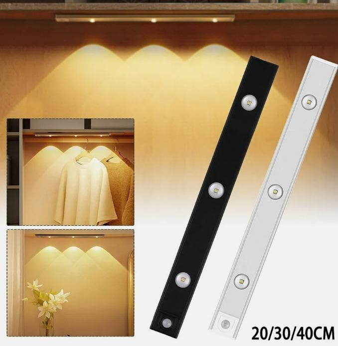 LED motion sensor cabinet light in black and white with bright illumination for closets and shelves