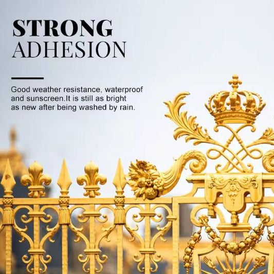 Ornate gold metal fence with crown ornament demonstrating strong adhesion using water-based glitter bronzing paint for outdoor use