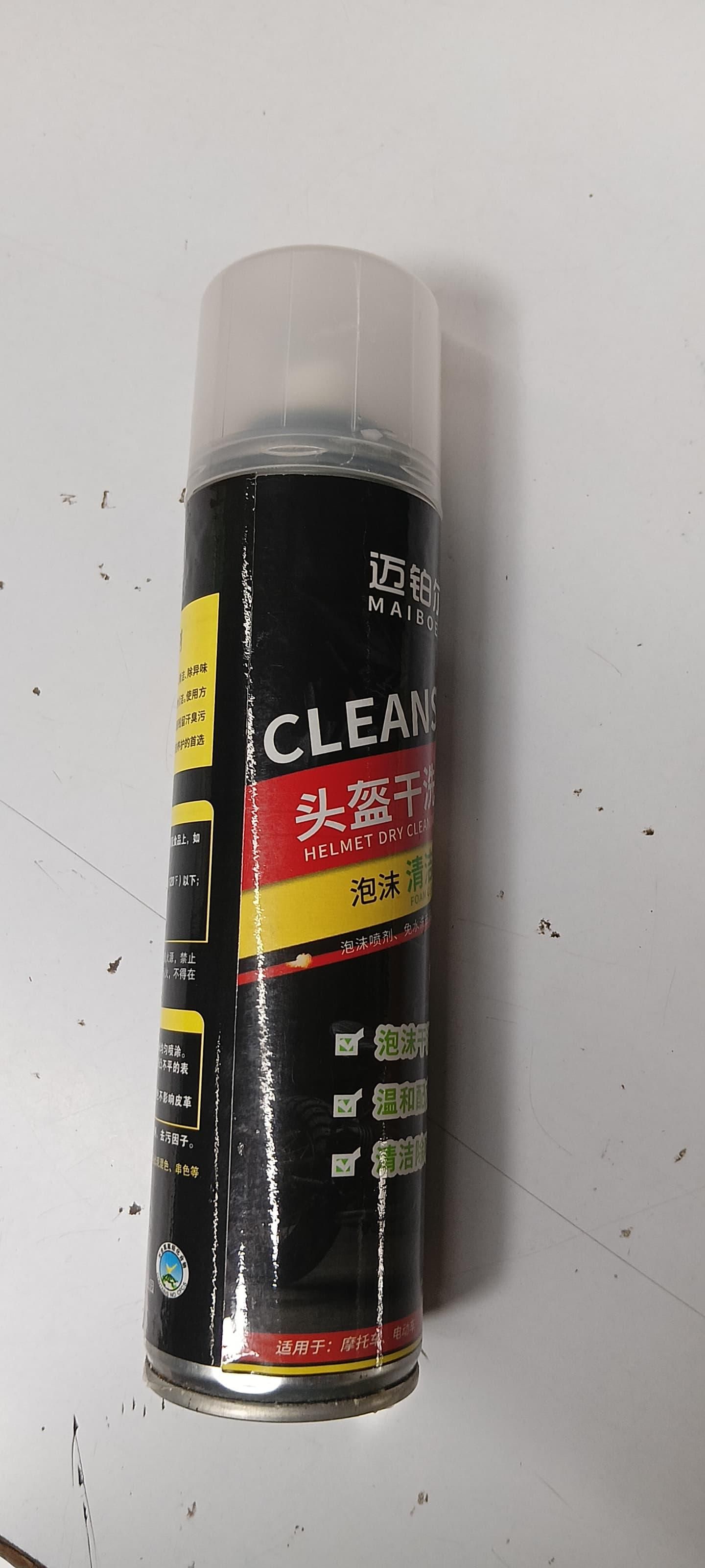 THE GIR FARMER helmet dry cleaning spray in a black can with clear cap for easy helmet maintenance