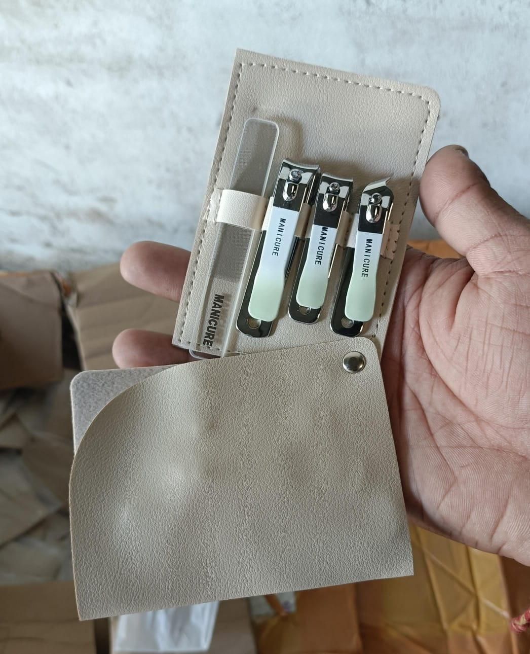 Durable nail grooming tools set including nail clippers and file in beige carrying case