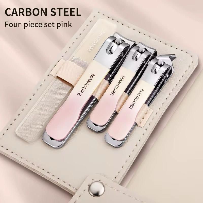 Durable nail grooming tools four-piece set with pink handles and filing accessories in a beige case