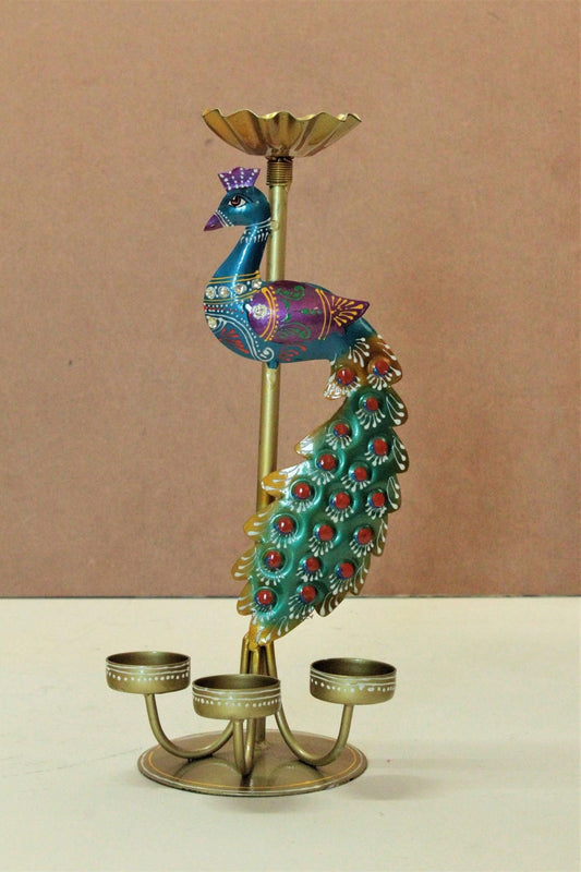 Decorative metal peacock tea light stand with colorful detailed peacock and three candle holders