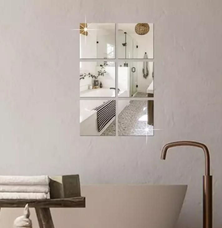 Modern acrylic mirror stickers for living room arranged in a 3 by 2 grid on a beige wall above bathtub
