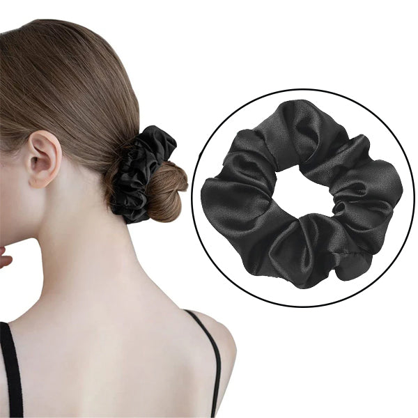Black mulberry silk elastic band for hair worn on a brown bun and shown separately