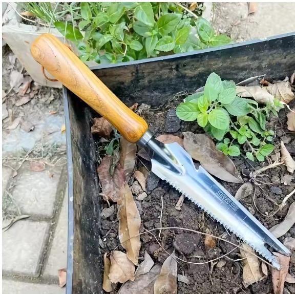 Multi-purpose weed remover with wooden handle and serrated metal blade for gardening and weed control