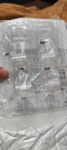 The Gir Farmer multifunctional rod holder clips made of clear plastic with metal springs packed in plastic