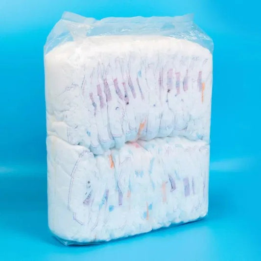 THE GIR FARMER natural eco-friendly baby diapers in a packaged stack for environmentally conscious parents