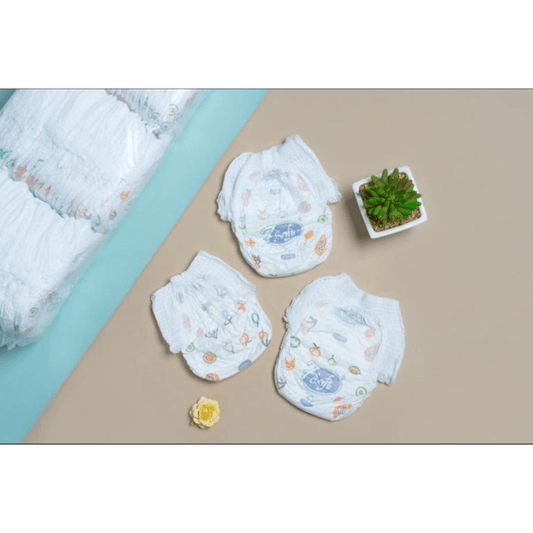 Natural newborn diapers 75 pack from THE GIR FARMER, featuring a soft and colorful design for comfort.