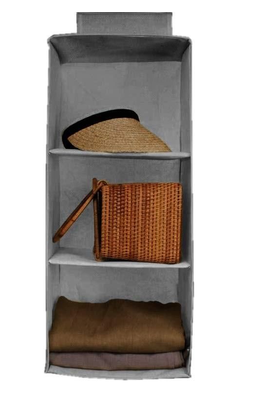Gray non-woven fabric storage shelves with three compartments holding a hat, wicker basket, and folded clothes