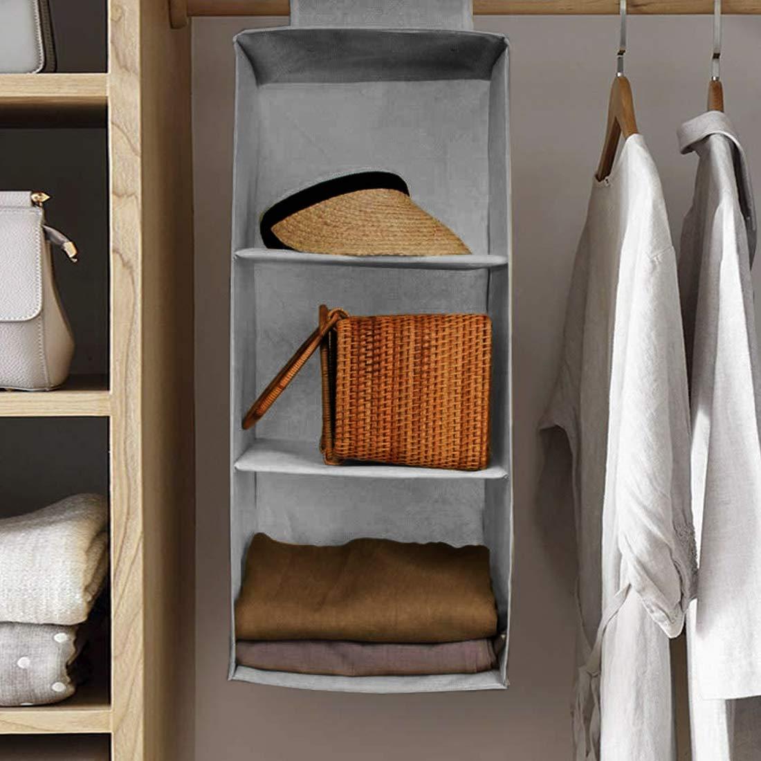 Gray non-woven fabric storage shelves hanging in closet with hat, wicker bag, and folded clothes
