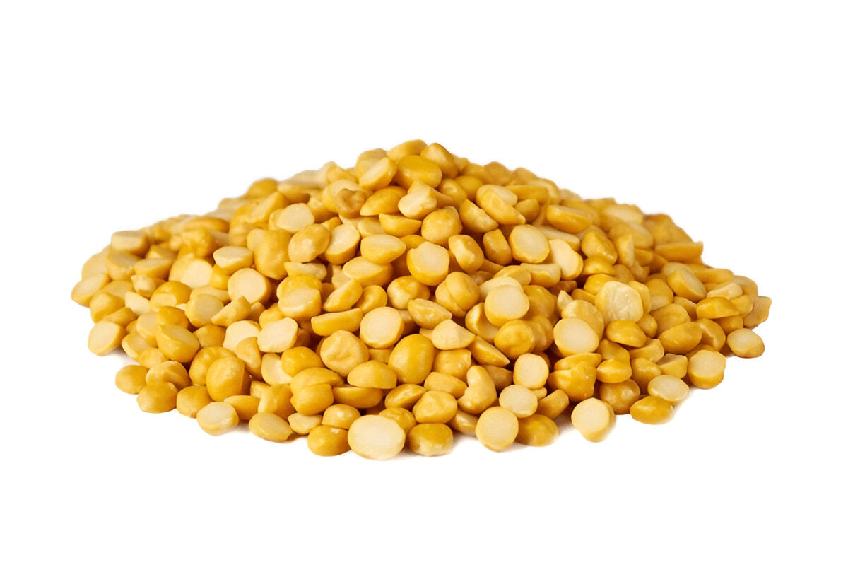 Pile of yellow organic chana dal split chickpeas from THE GIR FARMER on white background