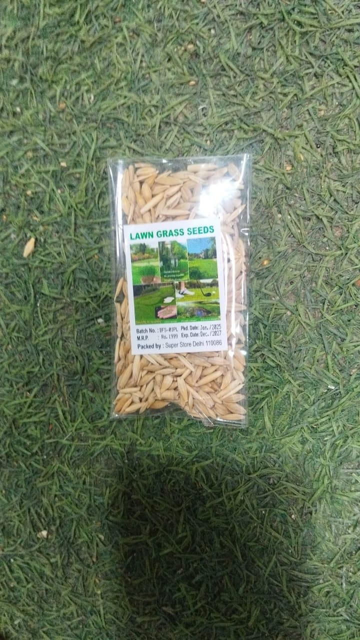 Pack of lawn grass seeds on green grass background by THE GIR FARMER organic herbicide granules for grass