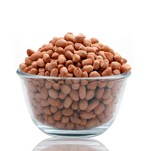 Clear glass bowl filled with organic raw peanuts from THE GIR FARMER
