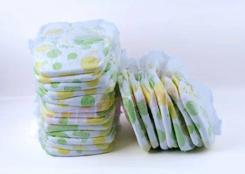 Pack of organic XXL baby diapers with colorful polka dots for comfortable and safe diapering