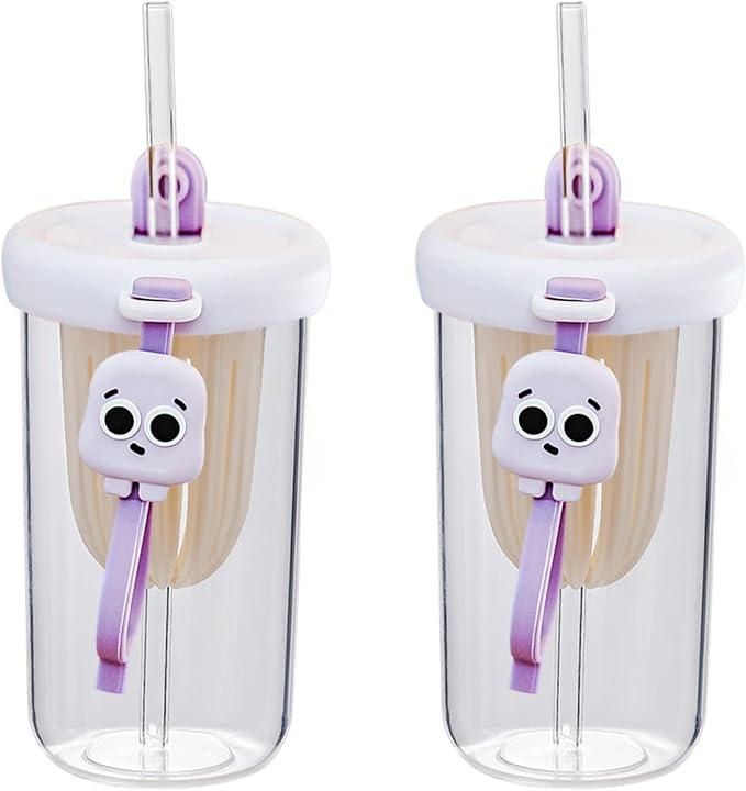 Glass smoothie tumbler with lid featuring a clear body and cute purple skull clip on straw
