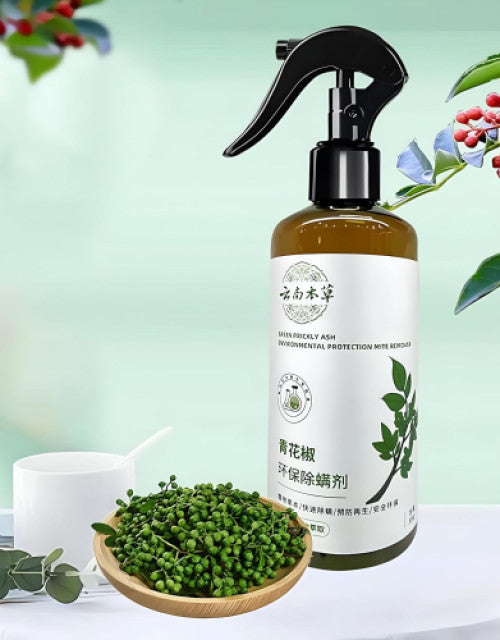 Dropdash plant extract anti-mite spray in a brown bottle with a spray nozzle, surrounded by plant extracts