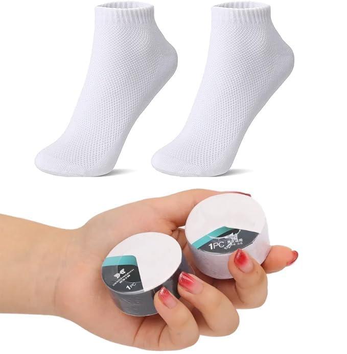 White portable disposable travel socks packaged for convenience during trips