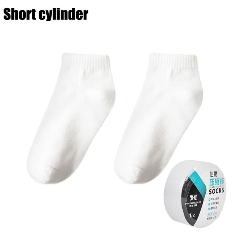 White portable disposable travel socks in a compact packaging for easy packing and convenience