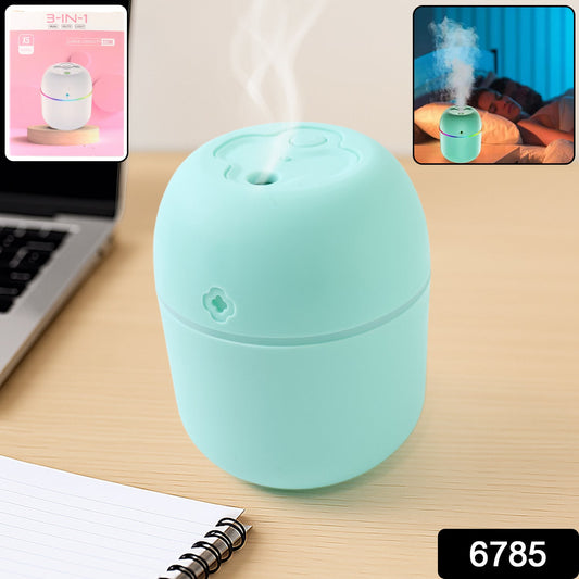 Portable mini USB humidifier in mint green for enhancing air quality in office spaces