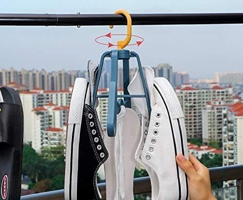 THE GIR FARMER portable shoe organizer hanging outdoor with black and white sneakers on rotating hook