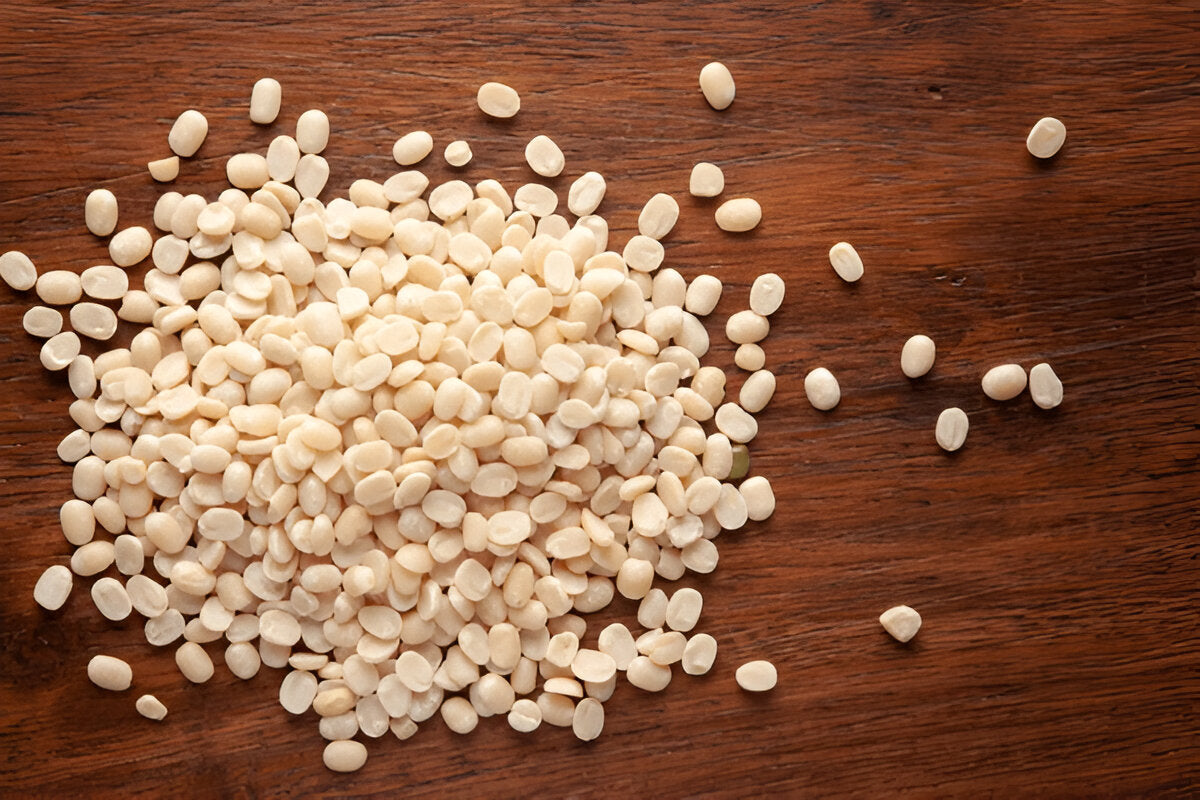 THE GIR FARMER pure urad dal for sale displayed on a wooden surface in a close-up view