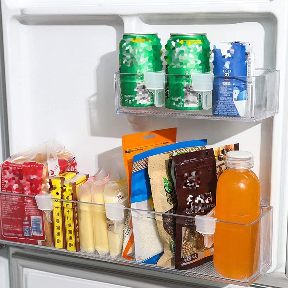 Clear refrigerator organizer bins filled with drinks and snacks for neat fridge storage