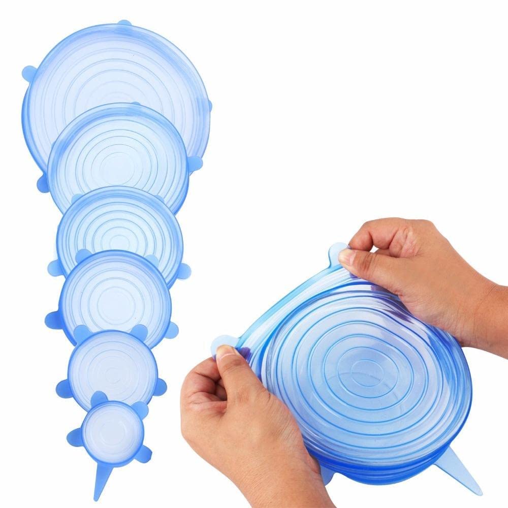 THE GIR FARMER reusable lids for bowls and containers in multiple sizes held by hands stretching blue silicone lids