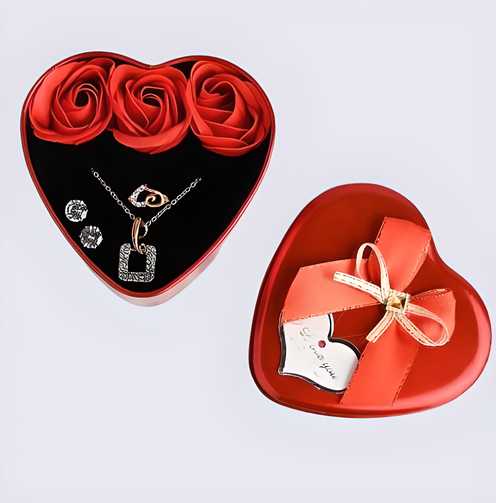 Heart-shaped box with red roses and silver jewelry set in romantic jewelry and flower combo