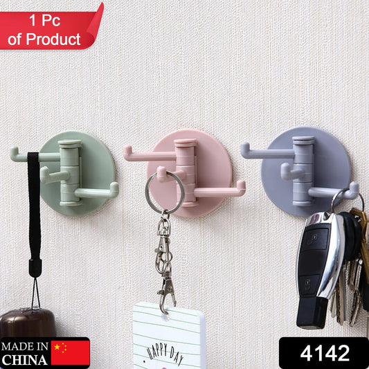 Rotating sticky wall hook set in pastel colors, perfect for organizing keys and small items