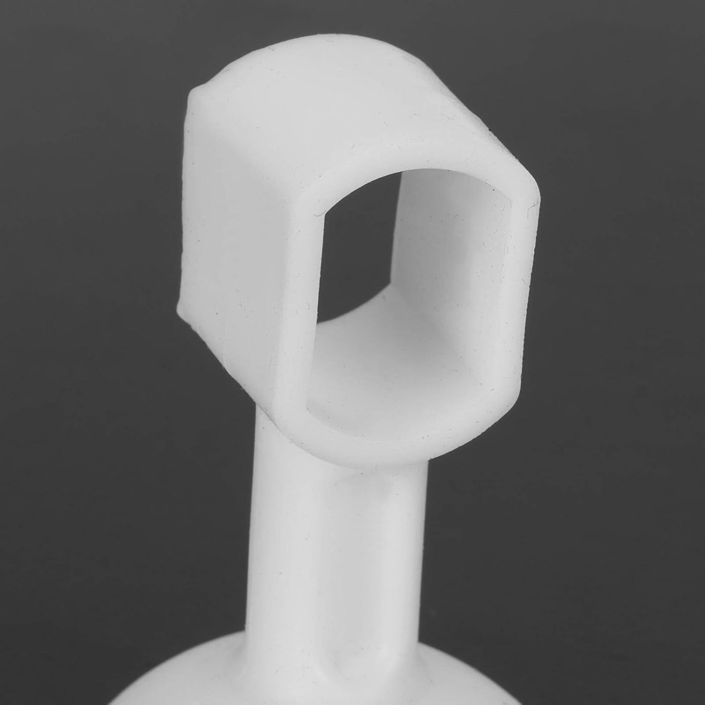 Close-up of a self-sucking silicone door stopper designed for secure door positioning