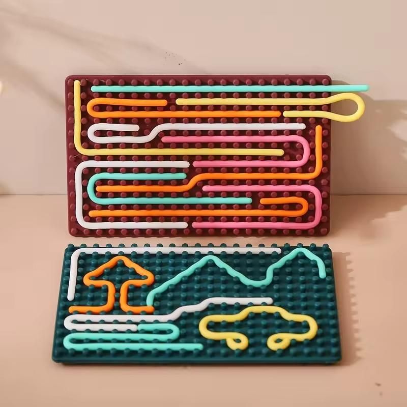 Colorful sensory development board for kids with movable wire tracks on two pegboards