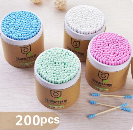 The Gir Farmer soft wood stick cotton swabs in blue white pink and green with 200 pieces in each container