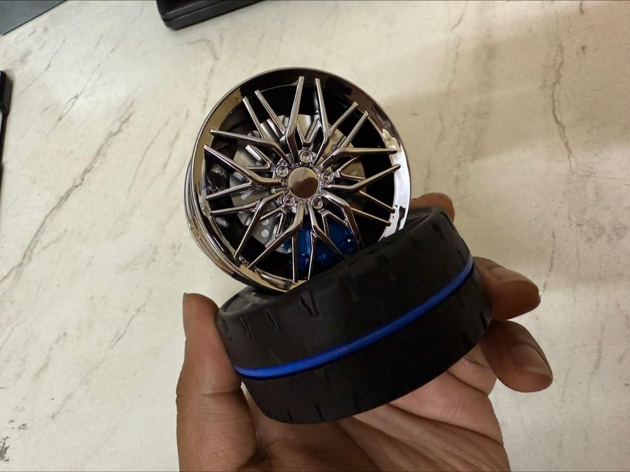 Solar powered car air freshener designed like a stylish wheel with high-quality details