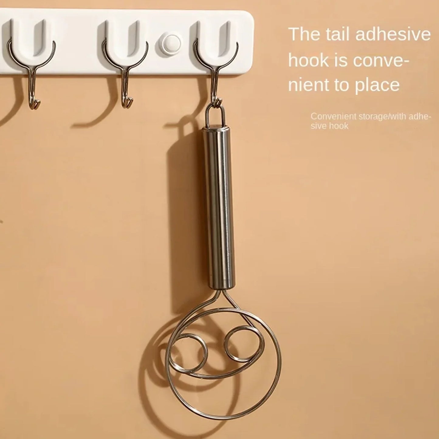 Best kitchen tool for pizza dough mixing stainless steel dough whisk hanging on adhesive wall hook