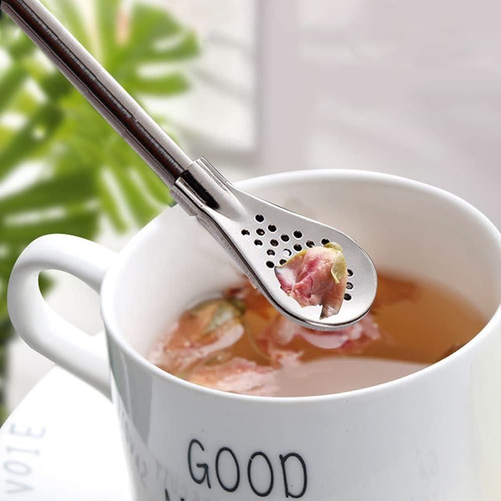 The Gir Farmer stainless steel drinking straws with built-in infuser spoon for brewing tea in white mug