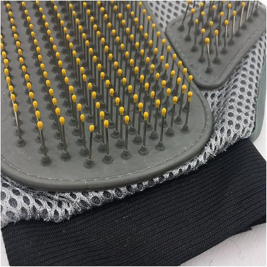 Close-up of a stainless steel pet grooming glove showing bristle texture for effective fur removal