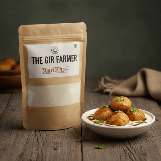 The Gir Farmer Dahi Vada Flour package beside freshly made dahi vada served on a plate