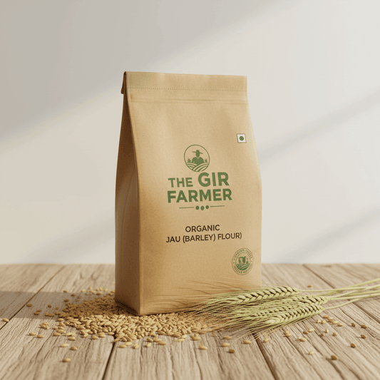 The Gir Farmer Organic Jau Flour in a brown eco-friendly bag with barley grains nearby