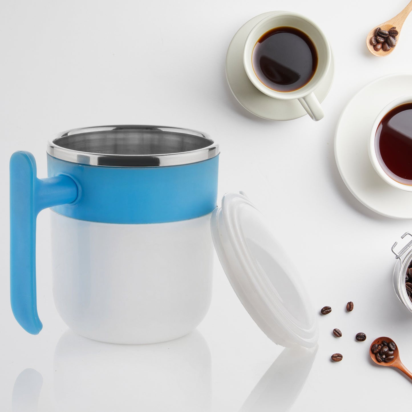 Wukusy thermal coffee cup for travel with a blue handle and stainless steel interior