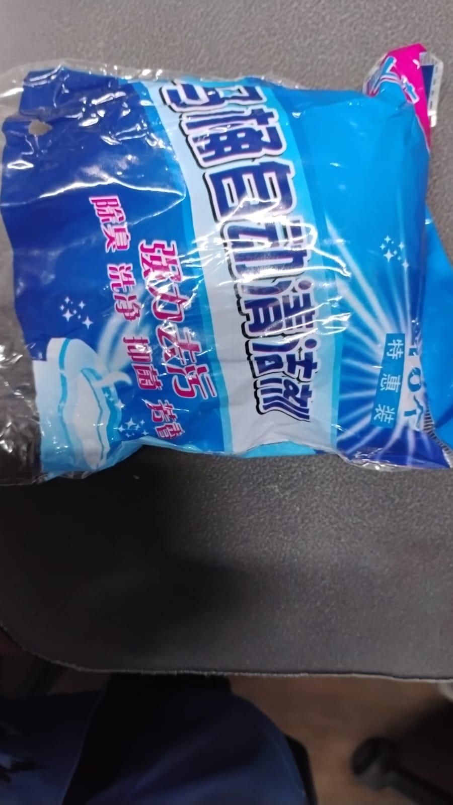 THE GIR FARMER blue package of toilet cleaning tablets with Chinese text on a gray surface