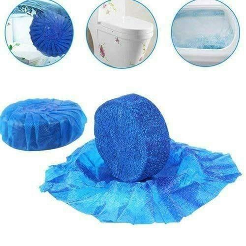 Blue toilet cleaning tablets releasing cleaning agents in toilet bowl for effective sanitation