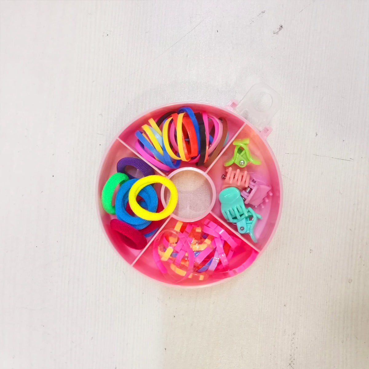 Amd-Deodap cute round hair accessories for girls in a pink divided case with colorful bands and clips